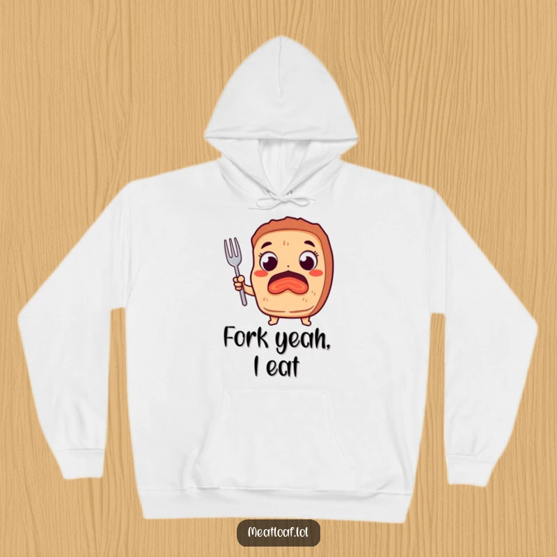 Funny hoodie featuring a meatloaf character with spirited, wide eyes holding a fork, radiating humorous hunger and anticipation.