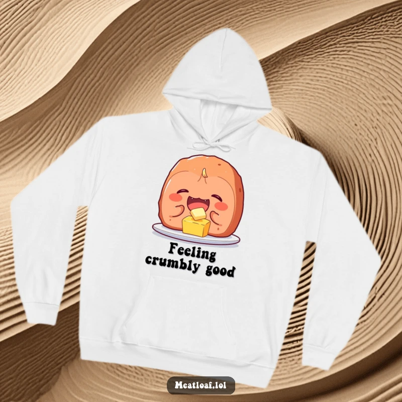 Funny meatloaf character hoodie, capturing uncontrollable giggles while tickling a tiny pat of butter, the epitome of cozy food comedy.
