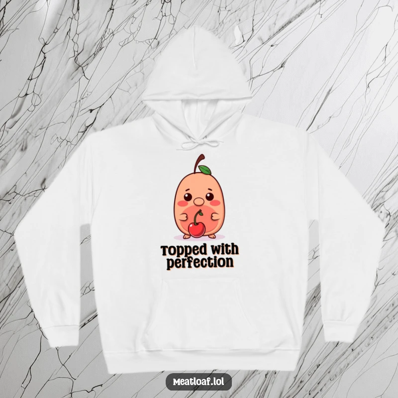 Funny kawaii meatloaf character skillfully balancing a cherry on its small nose, featured on a warm and cozy hoodie.