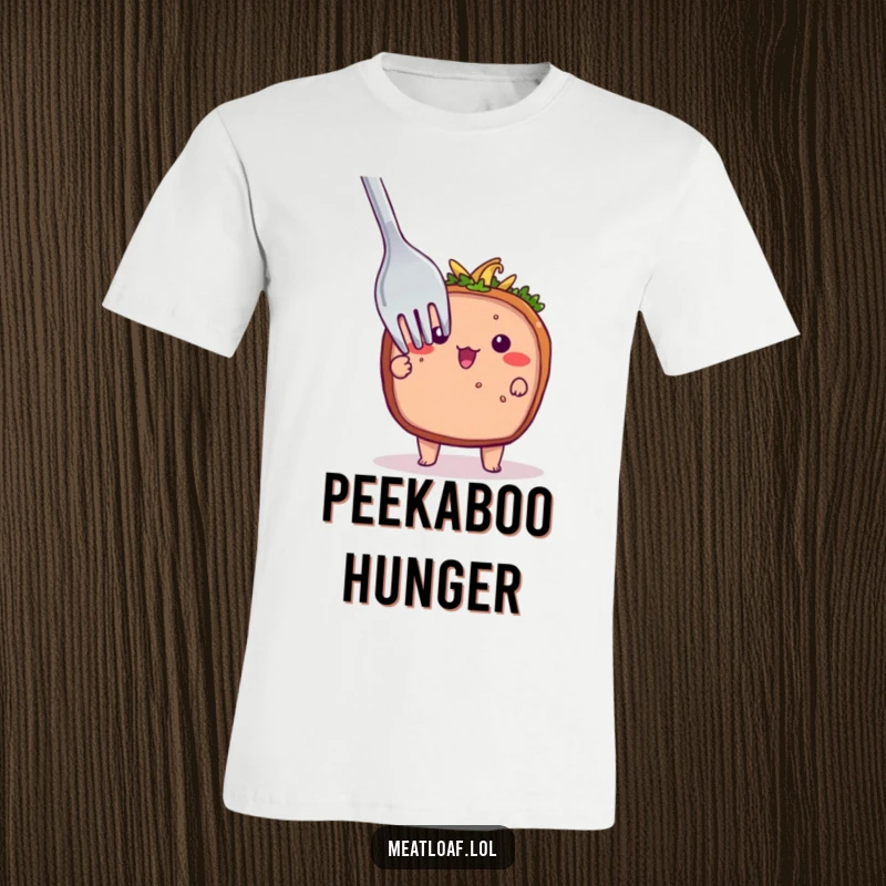 Funny t-shirt with a timid meatloaf character peeking shyly from behind a giant fork, conveying a sweet and humorous introversion.