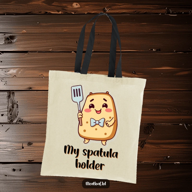 Funny Meatloaf Tote Bag: A happy meatloaf in a bowtie gives a warm hug to a cooking spatula.