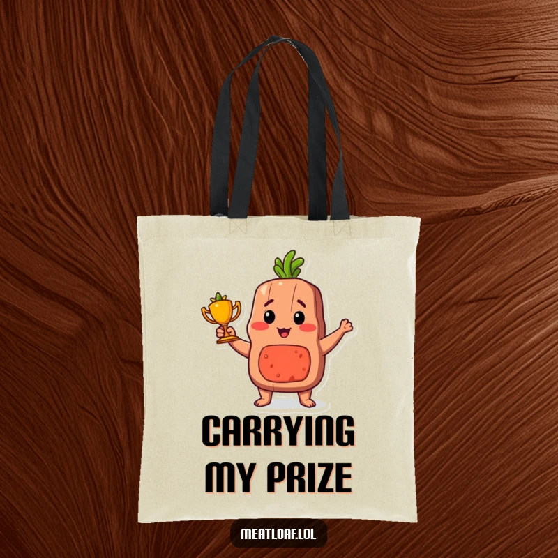 Funny proud meatloaf trophy tote bag, a durable bag showing a meatloaf character holding a carrot trophy.